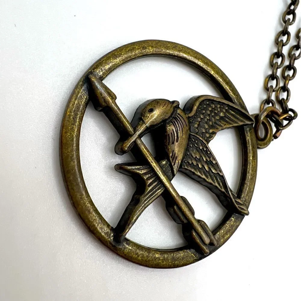 *3/$20* Hunger Games Mockingjay bronze tone necklace